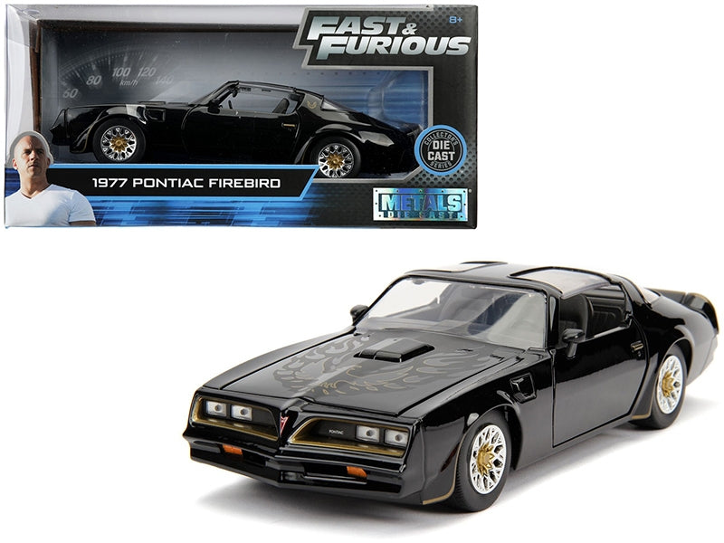 Black Tego's 1977 Pontiac Firebird diecast model car from Jada, inspired by the "Fast & Furious" movie series, 1/24 scale.