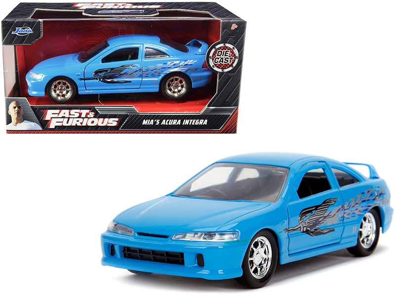 Light blue Jada Fast & Furious 1/32 diecast Acura Integra model car with "Fast & Furious" graphics.