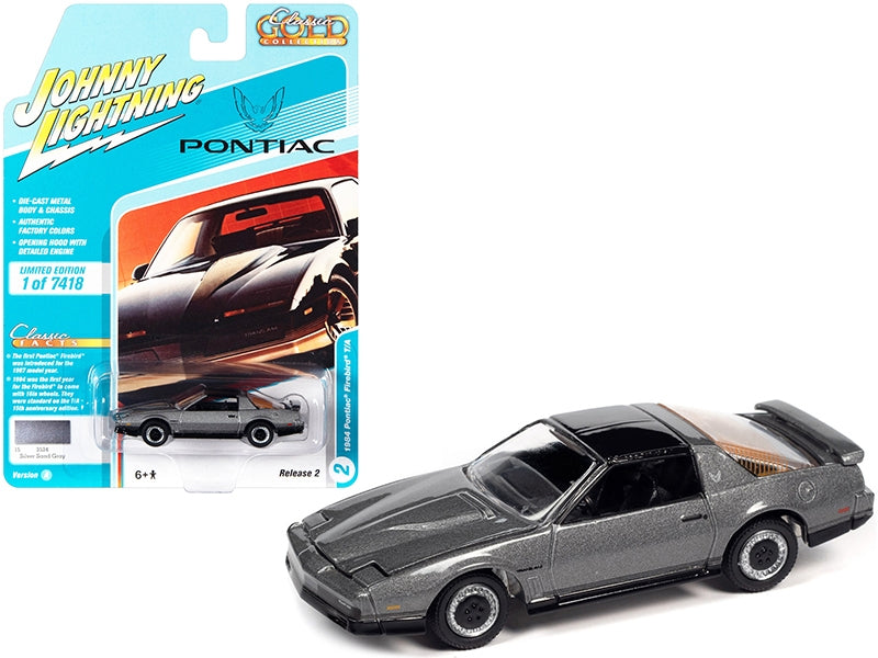 Silver Sand Gray metallic 1984 Pontiac Firebird Trans Am T/A diecast model car by Johnny Lightning, limited edition collectible.