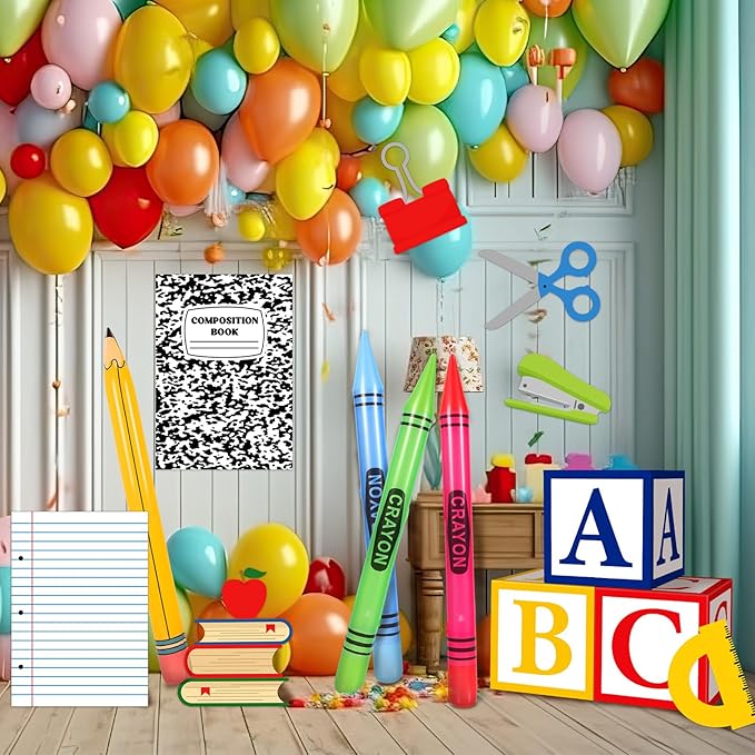 Set of 14 giant inflatable ABC alphabet-themed party favor boxes with large pencil and crayon designs for back-to-school celebrations.