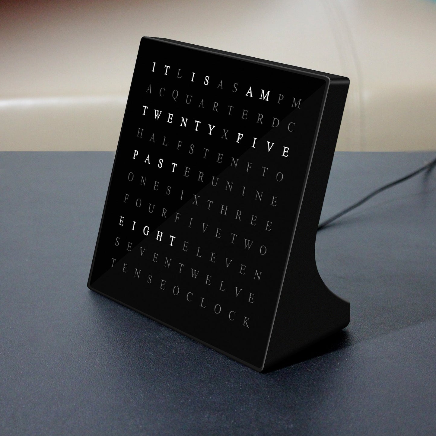 Black American Smart Alphabet Digital Word Clock displaying time with illuminated letters, modern desk and wall decor for home or office.