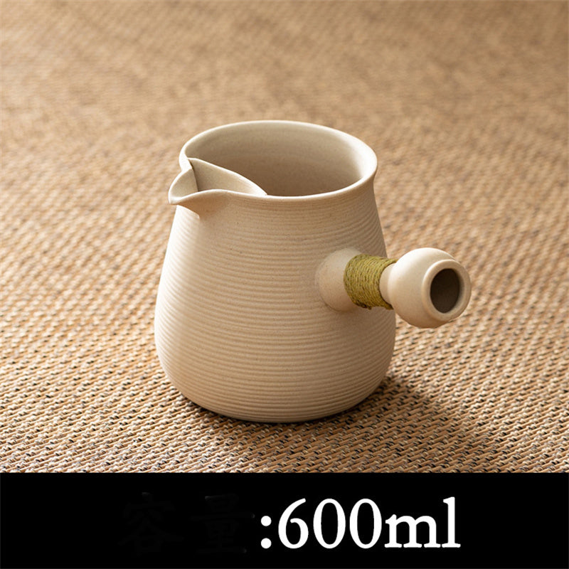 White mud boiled teapot by American Smart, 600ml ceramic teapot with a smooth finish, suitable for brewing tea.