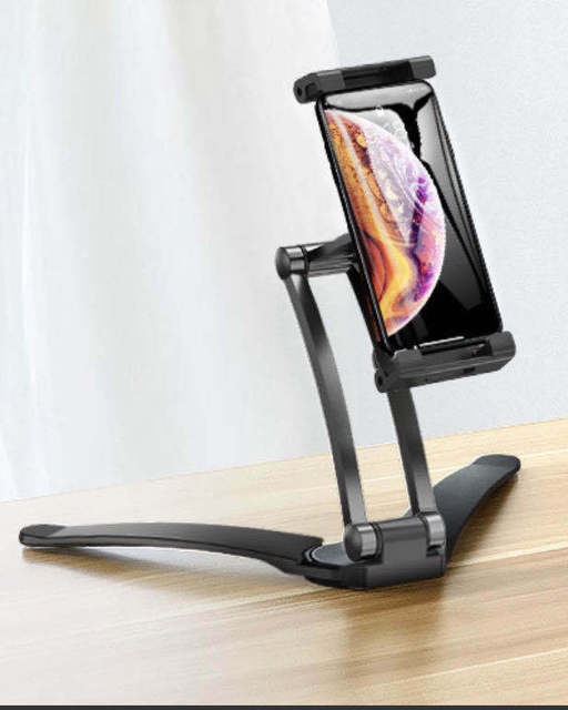 American Smart metal wall-mounted tablet stand holding a 5-10.5 inch tablet with smartphone holder and adjustable bracket.