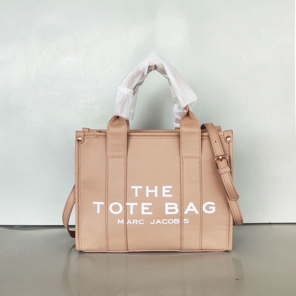 Small women's trendy tote bag by American Smart, stylish crossbody and shoulder bag with single strap and modern design.