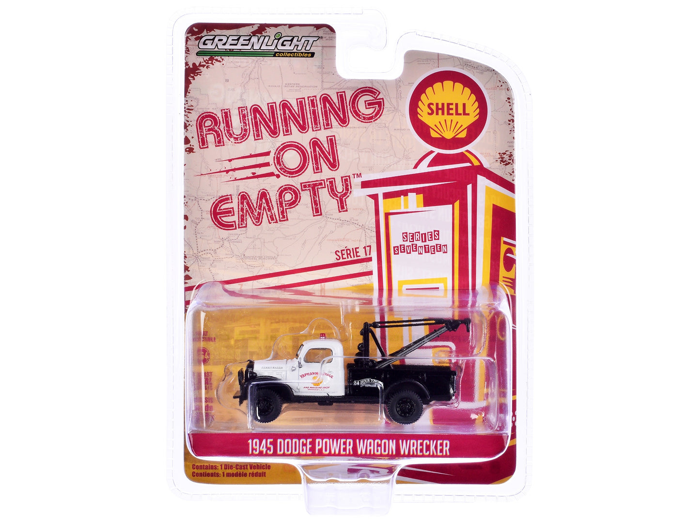 White and black 1945 Dodge Power Wagon Wrecker Tow Truck diecast model by Greenlight, "Shell Oil" series, 1/64 scale.
