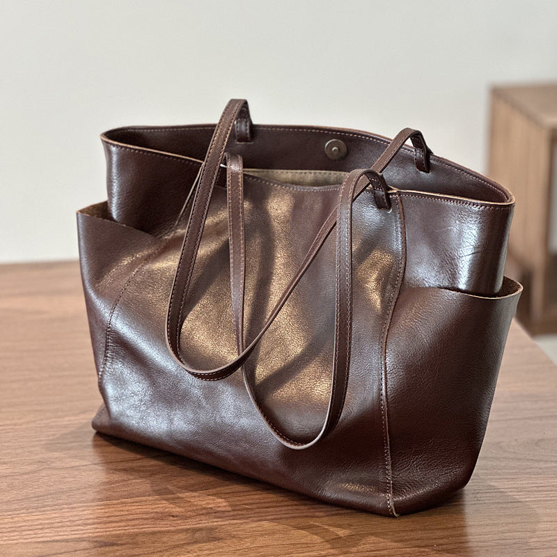 Large leather shoulder tote bag by American Smart – WB, featuring spacious interior and stylish design.