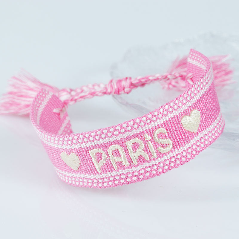 Embroidered Eiffel Tower woven wrist strap by eprolo, featuring Paris-themed ethnic design and colorful woven ribbon.