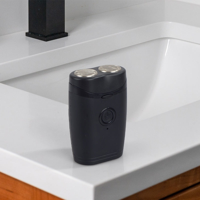 Portable eprolo men's dual head electric shaver with sleek design, showing close-up of dual shaving heads and ergonomic handle.