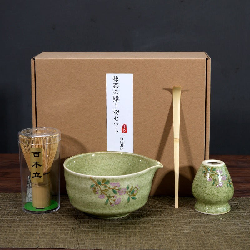 Ceramic matcha tea bowl and whisk set with bamboo scoop, perfect for traditional matcha tea preparation by eprolo.