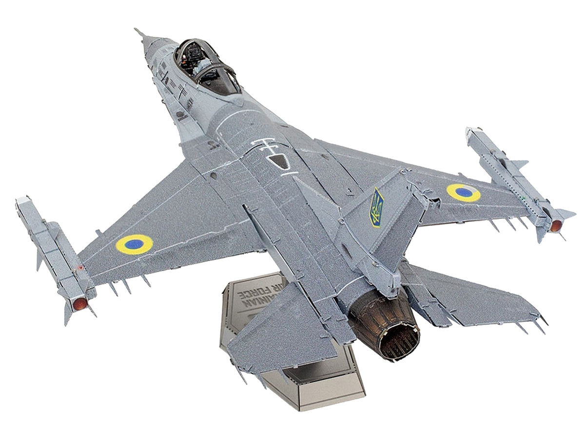 Steel model kit of Lockheed Martin F-16 Fighting Falcon aircraft for Ukrainian Air Force by Metal Earth, showing detailed assembled aircraft.