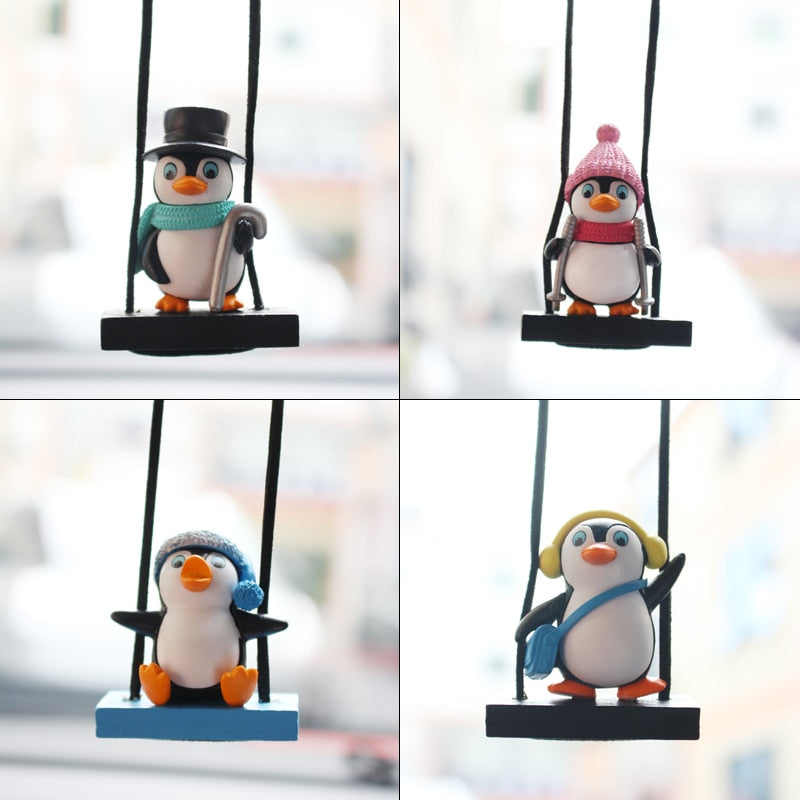 swing-sled-penguin-car-pendant-1