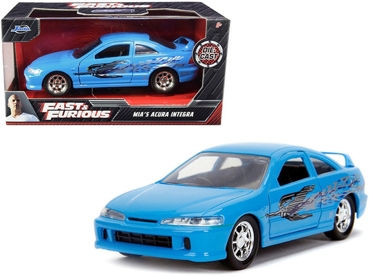 Light blue Jada Fast & Furious 1/32 diecast Acura Integra model car with "Fast & Furious" graphics.