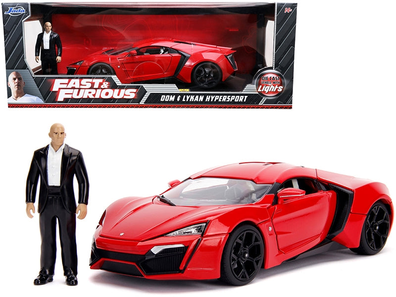 Red Lykan Hypersport diecast model car with lights and Dom figurine from Jada's Lykan Models series, inspired by Fast & Furious.