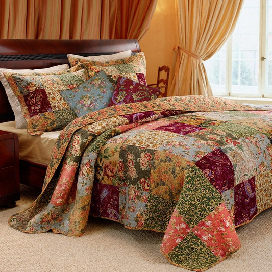 American Smart King size 100% cotton floral paisley quilt set with two shams and two decorative pillows on a bed.