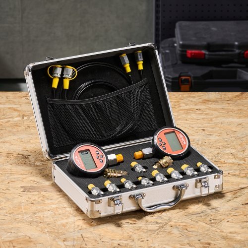Digital hydraulic pressure test coupling kit with two gauges, hoses, quick-release couplers, and test couplings for excavator machinery.