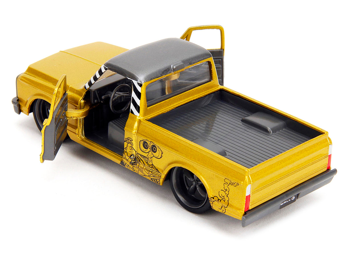 1972 Chevrolet Cheyenne pickup truck diecast model by Jada, gold metallic finish with gray top, from Hollywood Rides series.