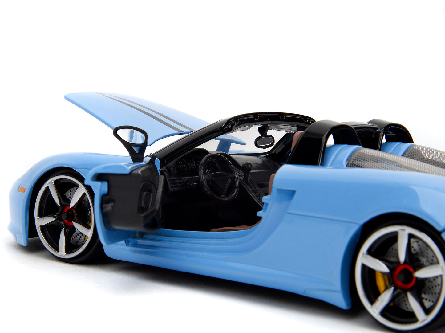 Blue Porsche Carrera GT convertible diecast model car with black stripes from Jada's Pink Slips Series, 1/24 scale.