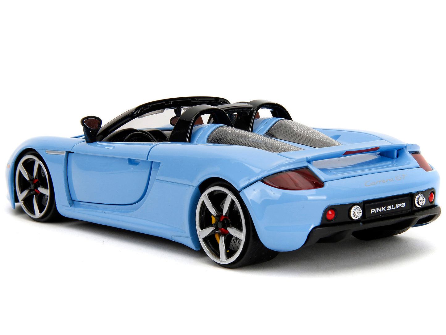 Blue Porsche Carrera GT convertible diecast model car with black stripes from Jada's Pink Slips series, 1/24 scale.