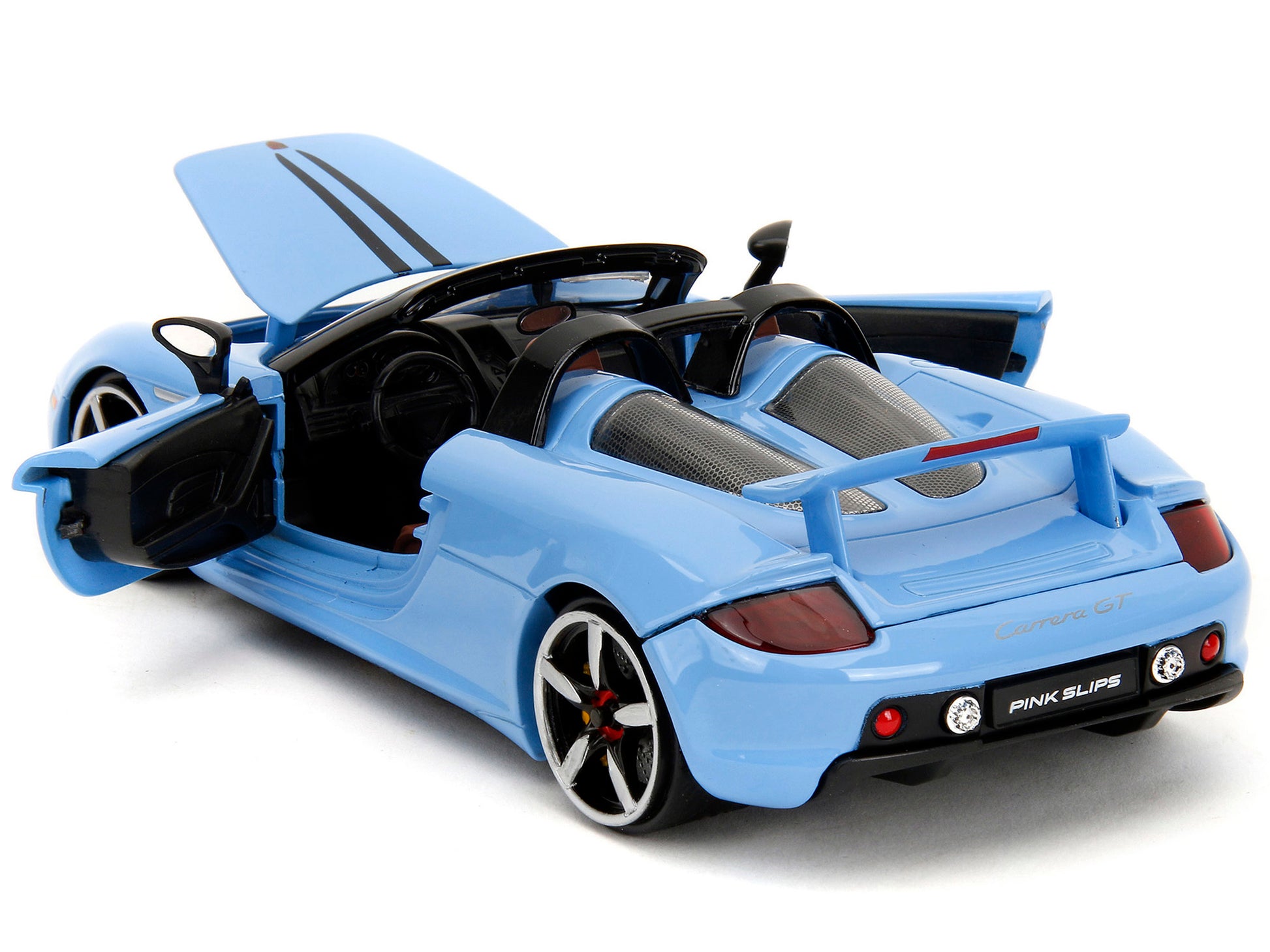 Blue Porsche Carrera GT convertible diecast model car with black stripes, part of Jada's Pink Slips Series, 1/24 scale.