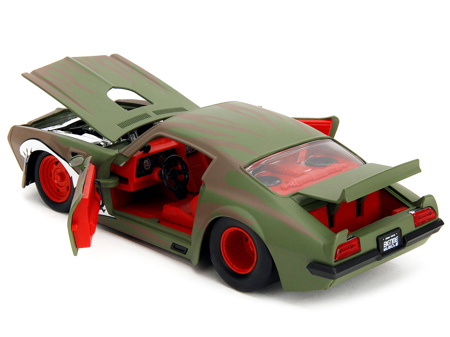 1972 Pontiac Firebird Jada diecast model car with green camouflage flames, red interior, detailed graphics, part of Bigtime Muscle series.