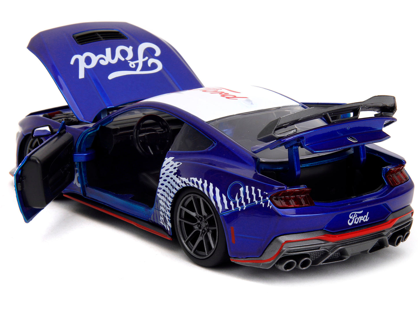 2024 Ford Mustang Dark Horse candy blue diecast model by Jada with white top and Mustang horse graphics, 1/24 scale.