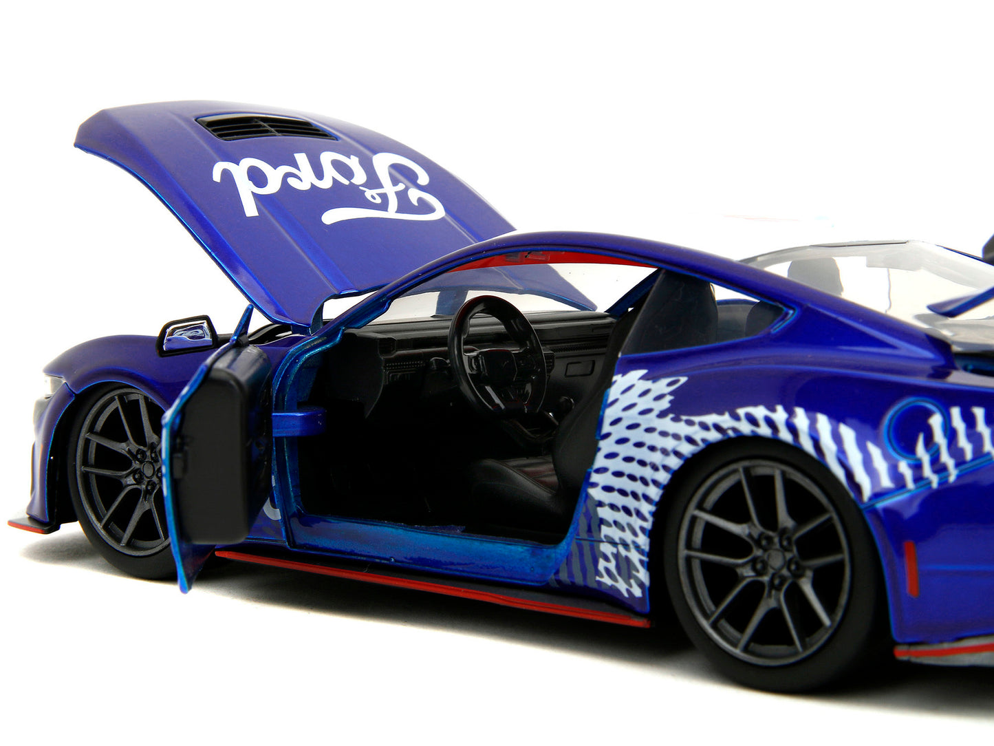 2024 Ford Mustang Dark Horse candy blue diecast model by Jada, featuring white top and Mustang horse graphics, scale 1/24.