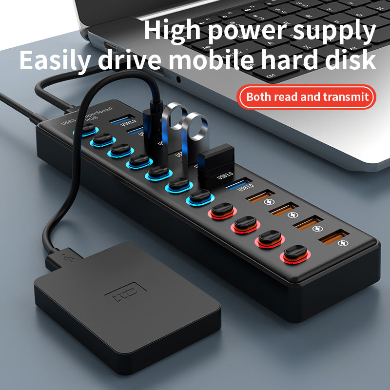 eprolo 3.1 Gen2 HUB3.0 laptop expansion dock with multiple ports and USB devices connected, showing its compact design and connectivity features.