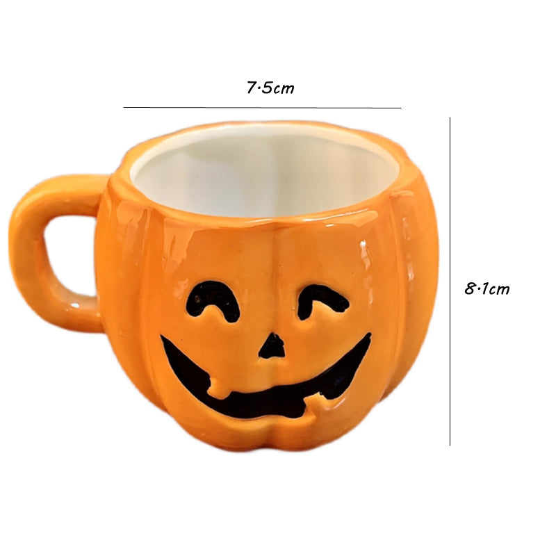 Ceramic Halloween pumpkin mug by ClaudiaG Home featuring a festive orange pumpkin design with a handle and seasonal detail.