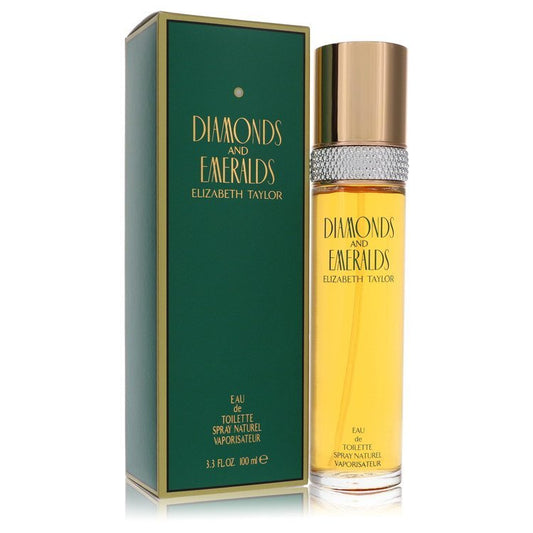 Elizabeth Taylor Diamonds & Emeralds Eau De Toilette spray 3.3 oz, featuring a decorative bottle with gold accents and colorful gemstone design.