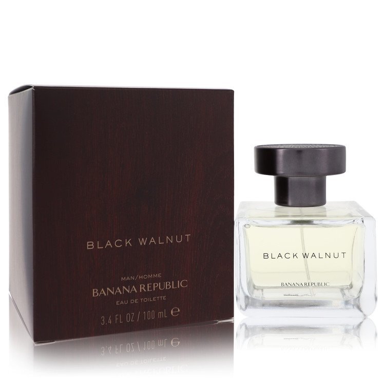 Banana Republic Black Walnut Eau De Toilette spray bottle for men, 3.3 oz, with black and gold packaging in the image.
