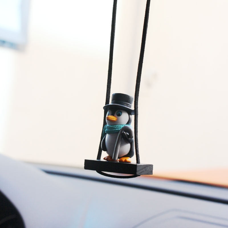 swing-sled-penguin-car-pendant-1
