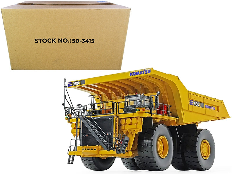 Komatsu 980E-AT dump truck diecast model by First Gear, 1/50 scale, detailed miniature construction vehicle.