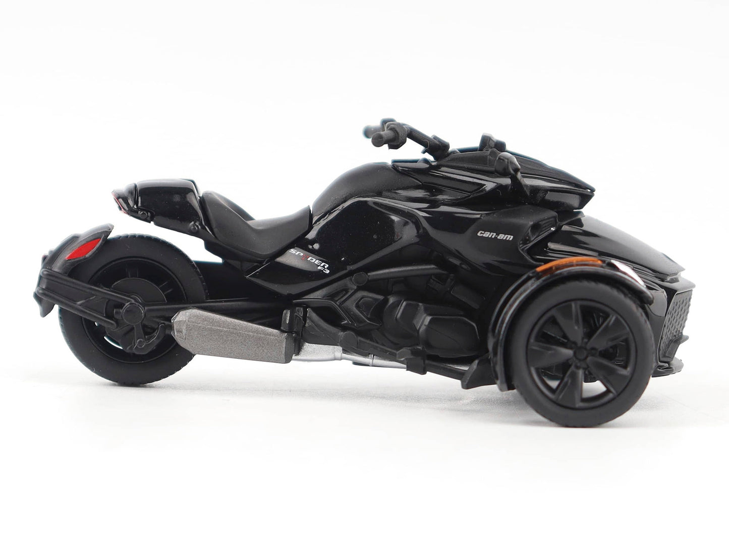 Black metallic Can-Am Spyder F3 3-wheel motorcycle diecast model by BRP Models, detailed scale replica in steel finish.