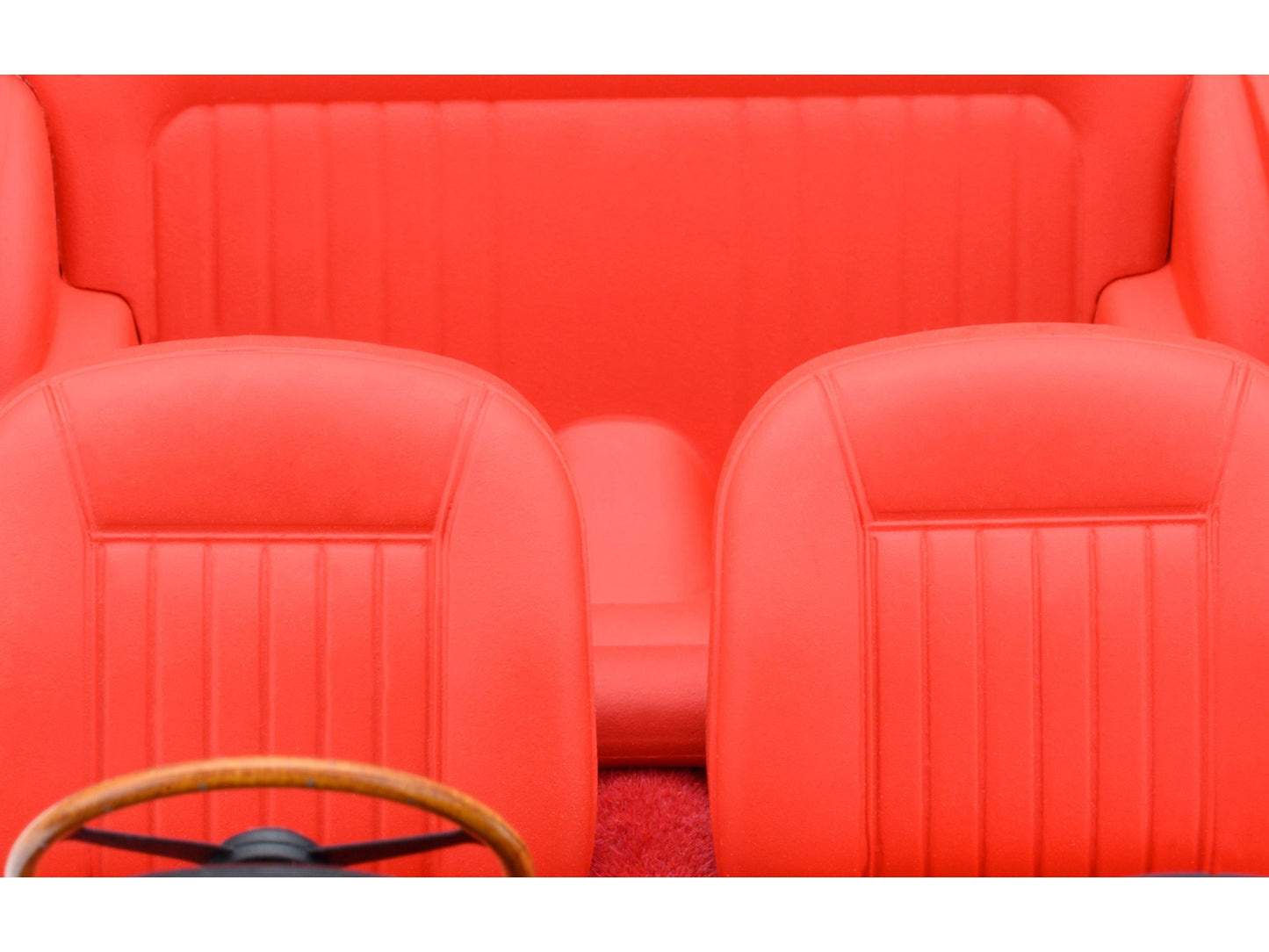 Autoart Aston Martin DB5 RHD model car in Dubonnet Rosso red metallic, 1/18 scale, detailed right-hand drive collectible model.