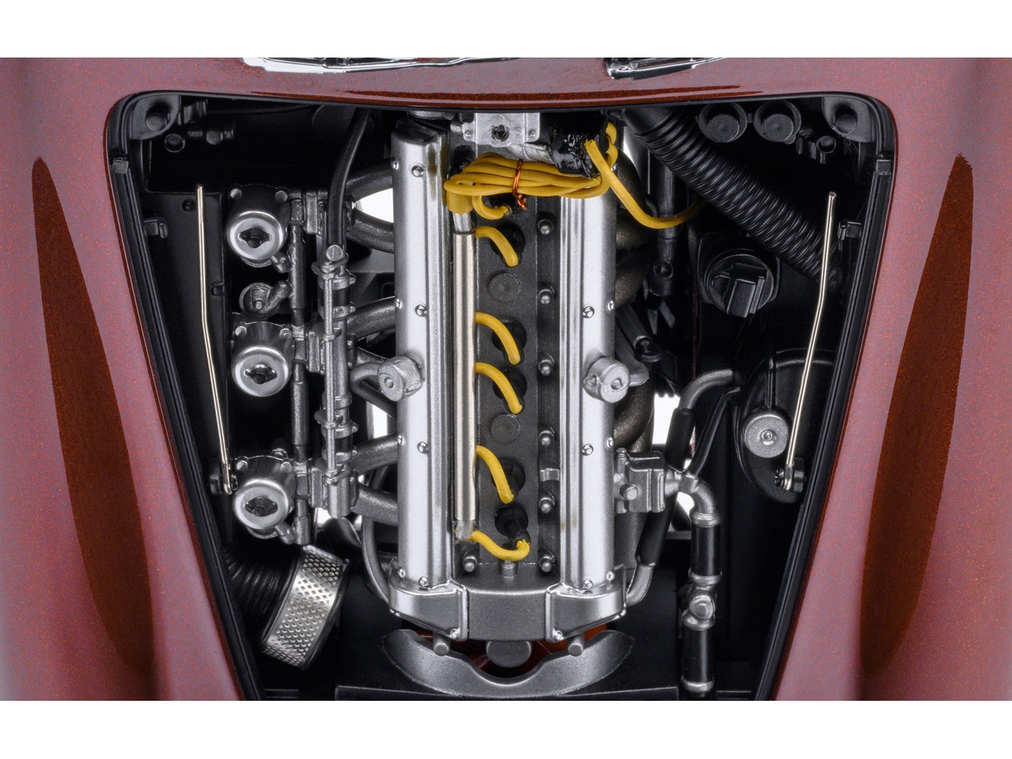 Autoart Aston Martin DB5 RHD model car in Dubonnet Rosso Red metallic finish, 1/18 scale, detailed collectible vehicle.