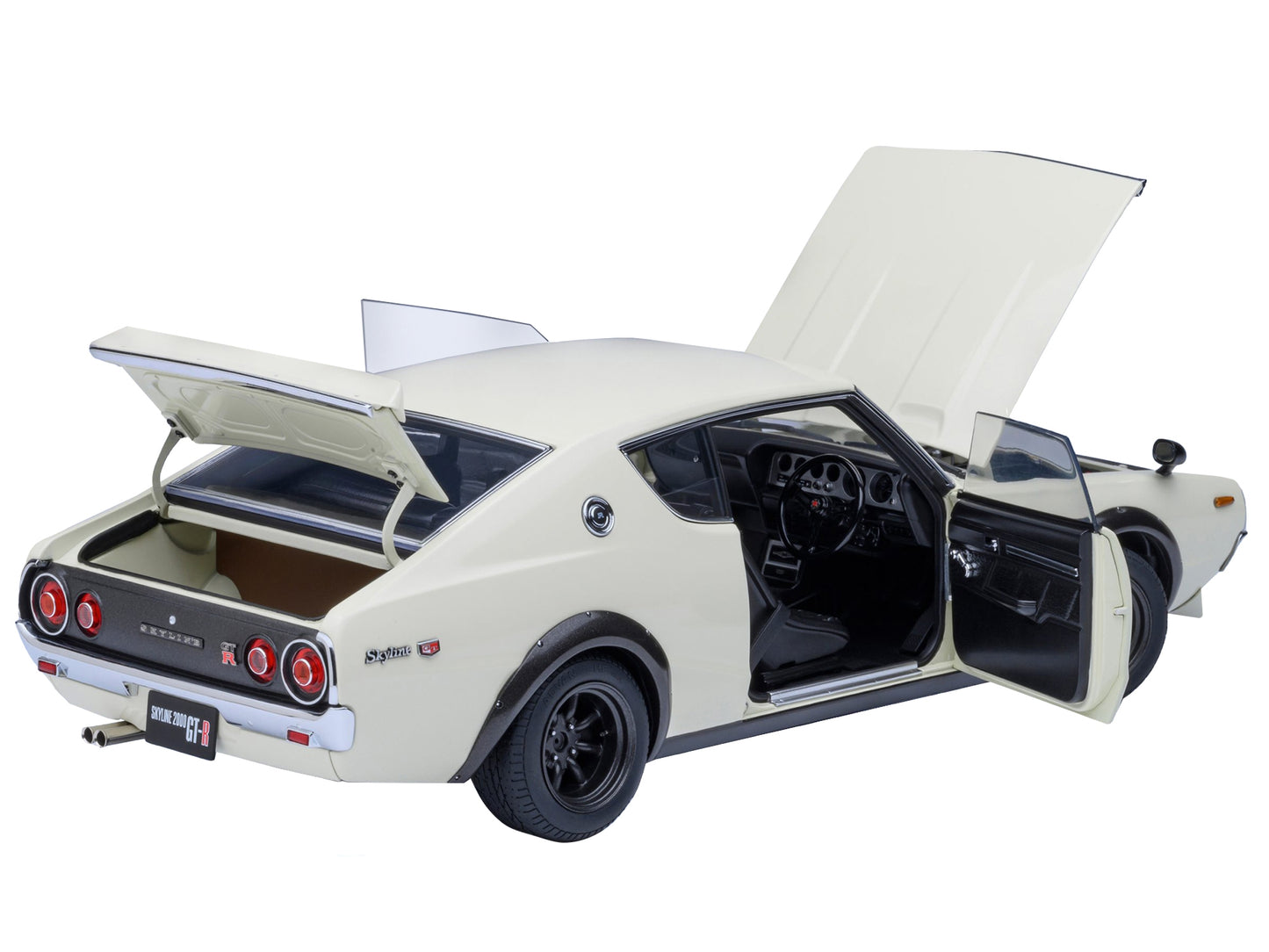 Autoart Nissan Skyline 2000GT-R KPGC110 tuned model car in white, right-hand drive, 1/18 scale, detailed collectible toy.