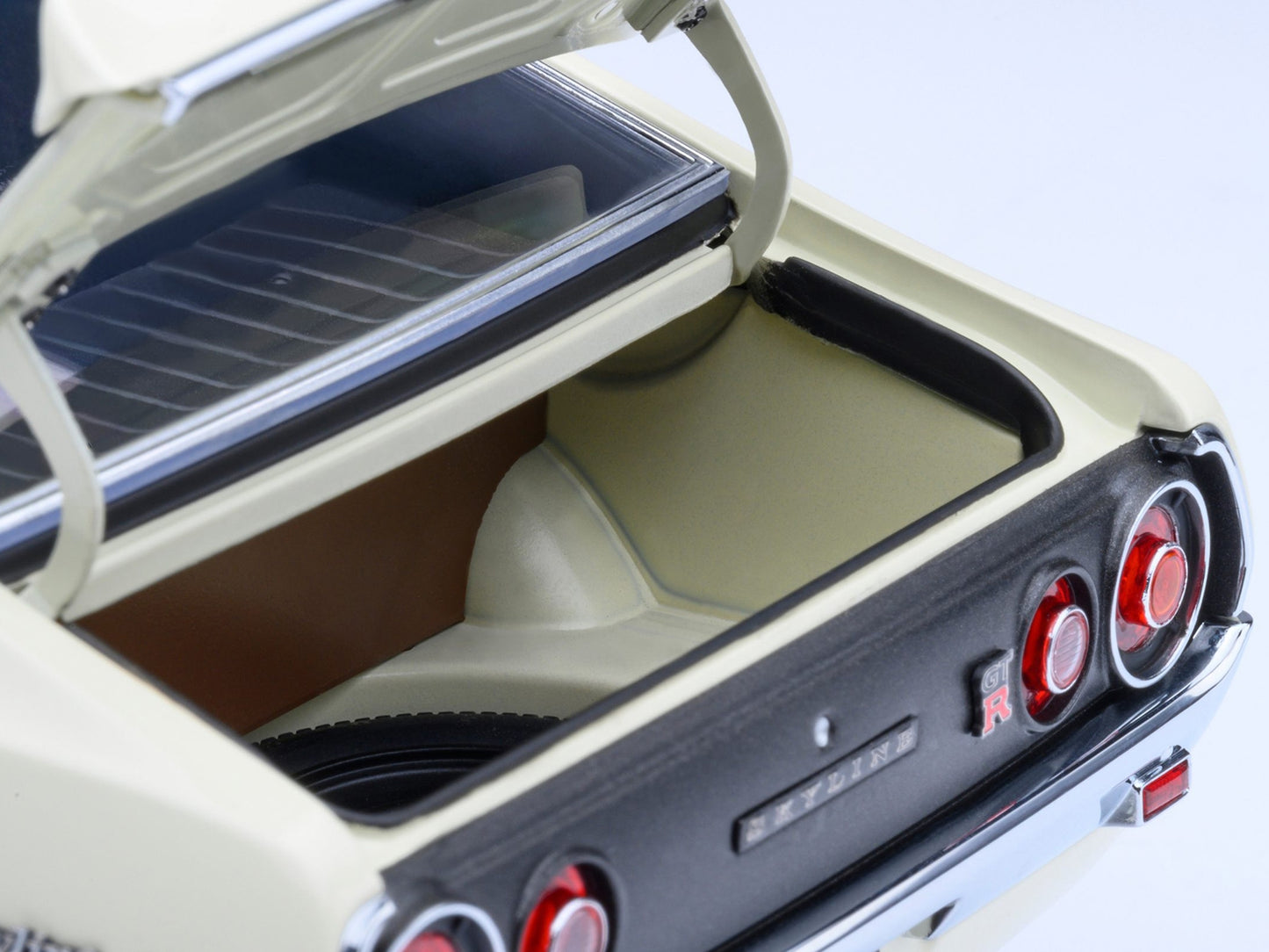 White Nissan Skyline 2000GT-R (KPGC110) tuned model car by Autoart, detailed 1/18 scale Nissan model with right-hand drive.