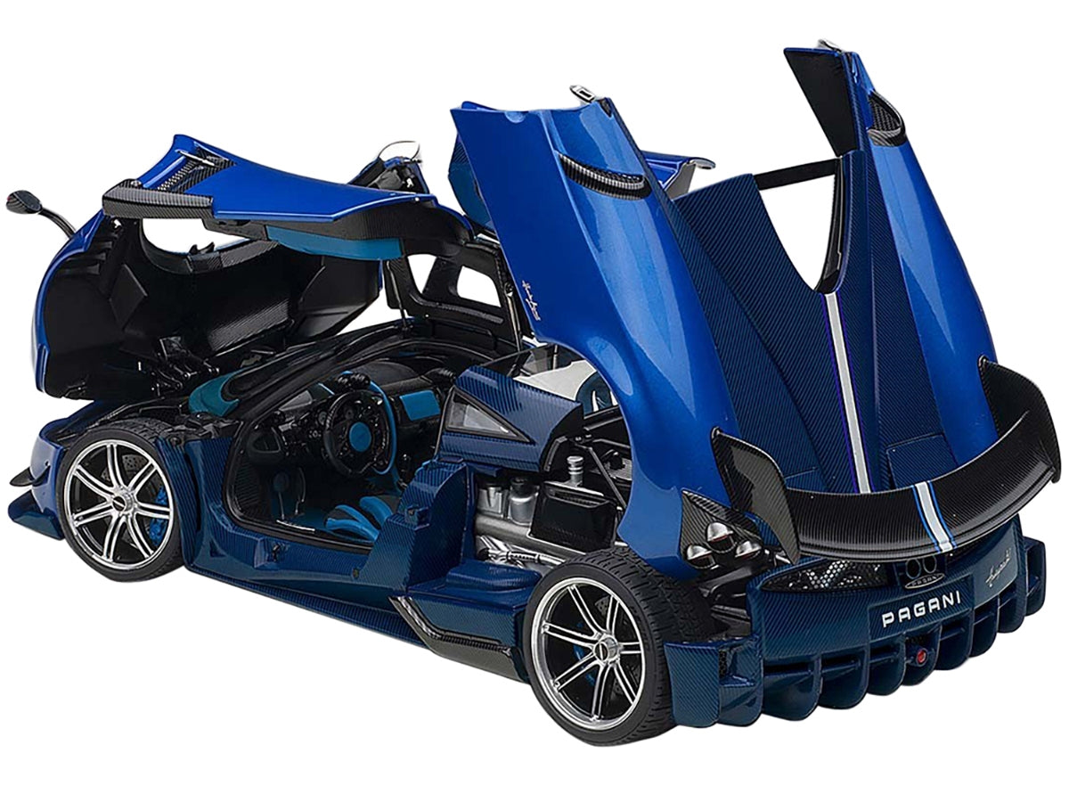 Autoart Pagani Huayra BC model car in Candy Blue Metallic with carbon accents, 1/18 scale, detailed automotive collectible.