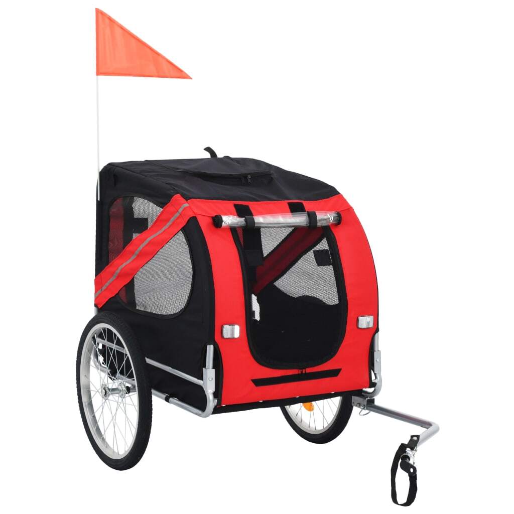 Red and black American Smart pet bike trailer attached to a bicycle, designed for safe and comfortable pet transportation.
