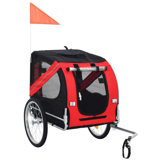 Red and black American Smart pet bike trailer attached to a bicycle, designed for safe and comfortable pet transportation.