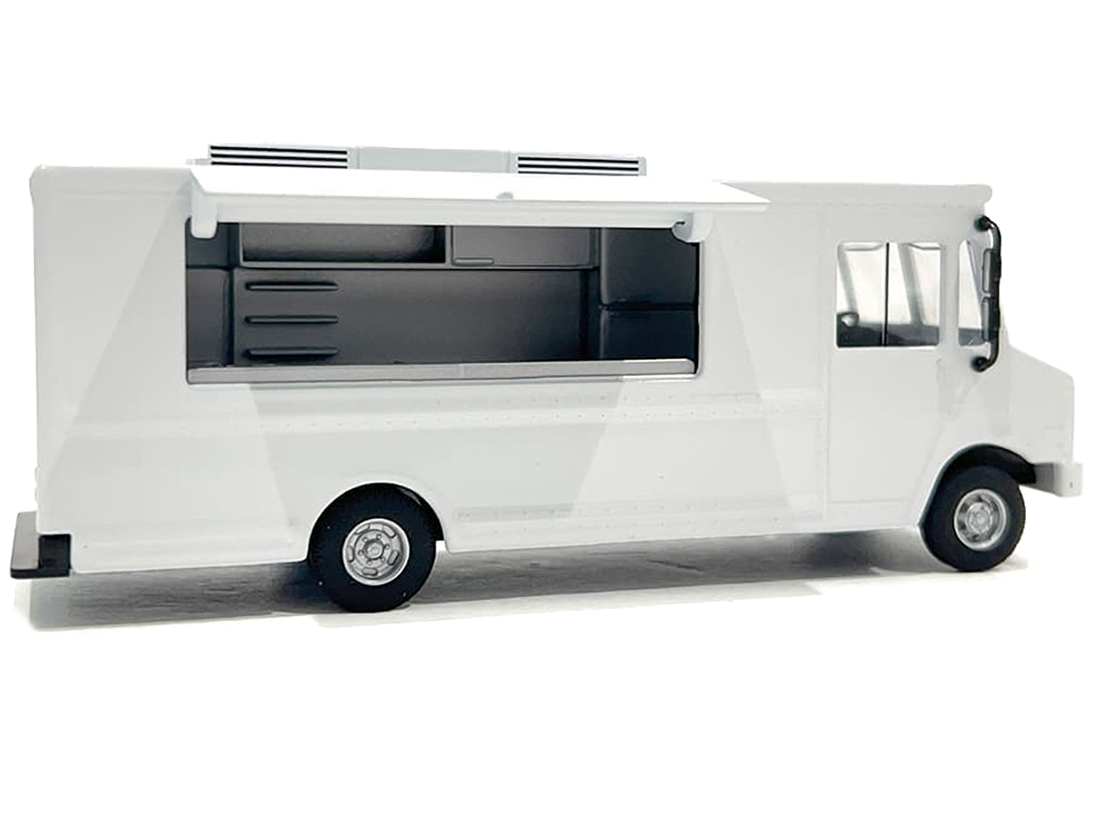 White food truck diecast model with graphics by American Diorama, 1/64 scale, detailed miniature for collectors or displays.
