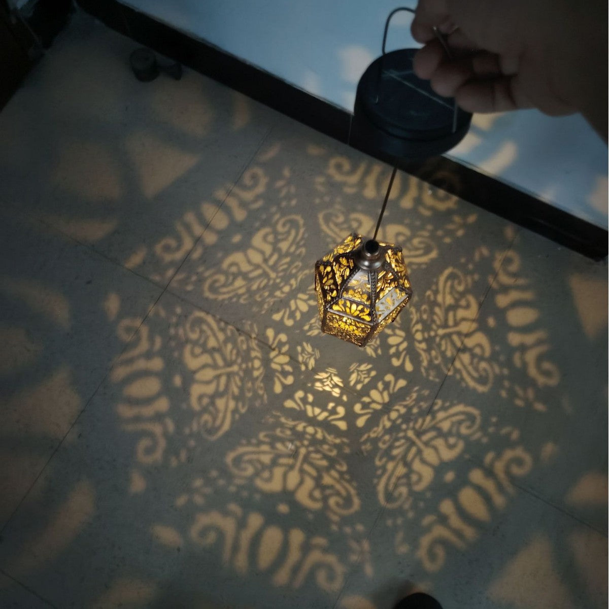 Solar iron hollow projection lamp