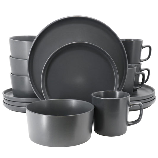 Elama Luxmatte dark grey 16-piece dinnerware set includes plates, bowls, and mugs with a matte finish and modern design.