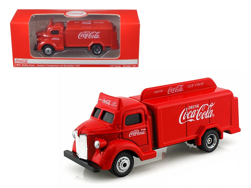 Red 1/87 scale Coca Cola delivery bottle truck diecast model by Motorcity Classics, detailed Coca Cola collectibles.