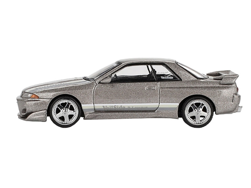 Gray metallic Nissan Skyline GT-R R32 model car by Mini GT, limited edition Veilside Combat C-I diecast in RHD 1/64 scale.
