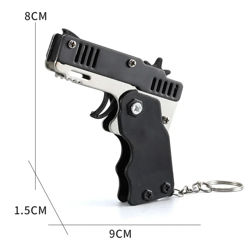 1x Mini Keychain Gun Rubber Band Toy Shooting Pistol Alloy Kid Outdoor Activities Party Game Birthday Gift for Children Creative