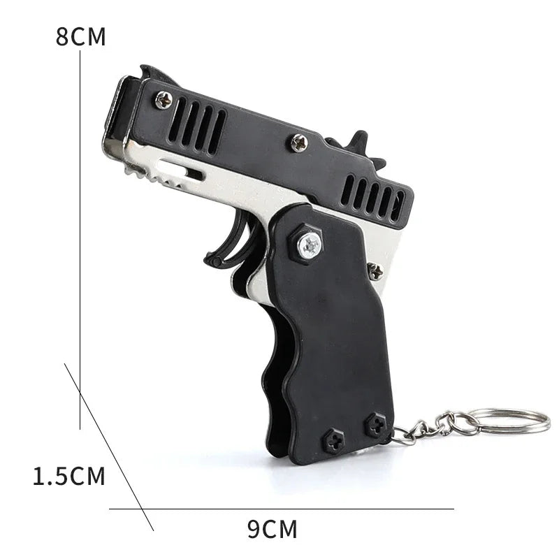 1x Mini Keychain Gun Rubber Band Toy Shooting Pistol Alloy Kid Outdoor Activities Party Game Birthday Gift for Children Creative