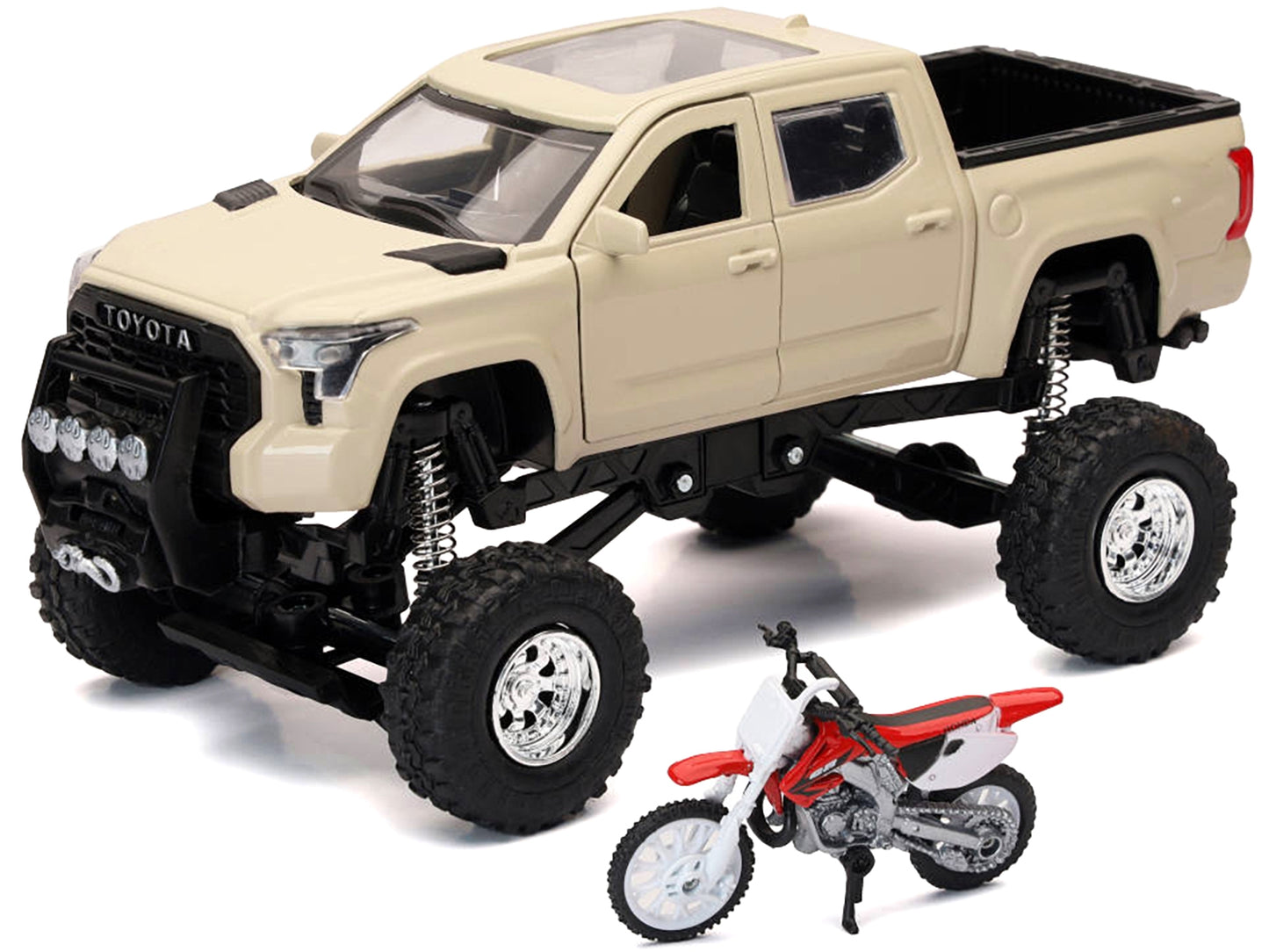 Toyota Tundra Pro pickup truck in tan and Honda CR250R motorcycle in red and white diecast models by New Ray, off-road series.