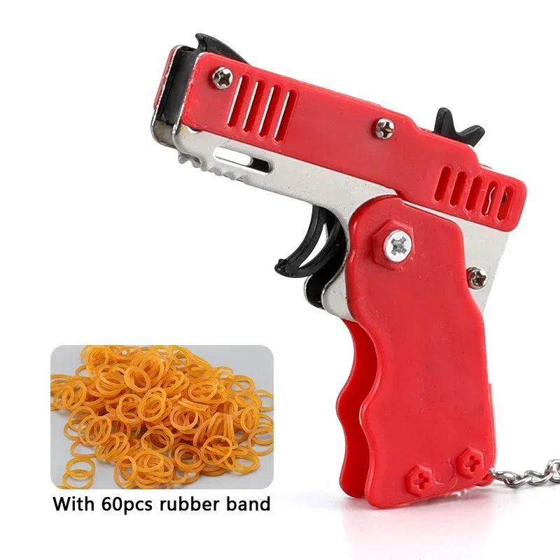 1x Mini Keychain Gun Rubber Band Toy Shooting Pistol Alloy Kid Outdoor Activities Party Game Birthday Gift for Children Creative