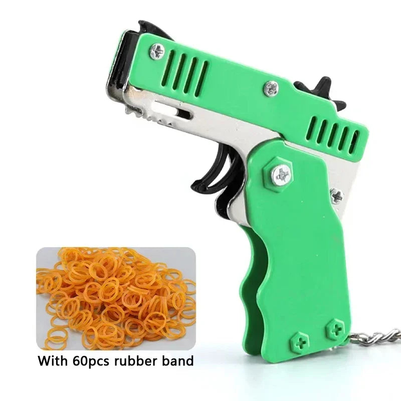 1x Mini Keychain Gun Rubber Band Toy Shooting Pistol Alloy Kid Outdoor Activities Party Game Birthday Gift for Children Creative